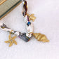 Collar de Tela con Dijes de Acero Inoxidable CAI3195-1