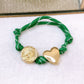 Pulsera Tejida con Dijes de Chapa de Oro COP1750-2
